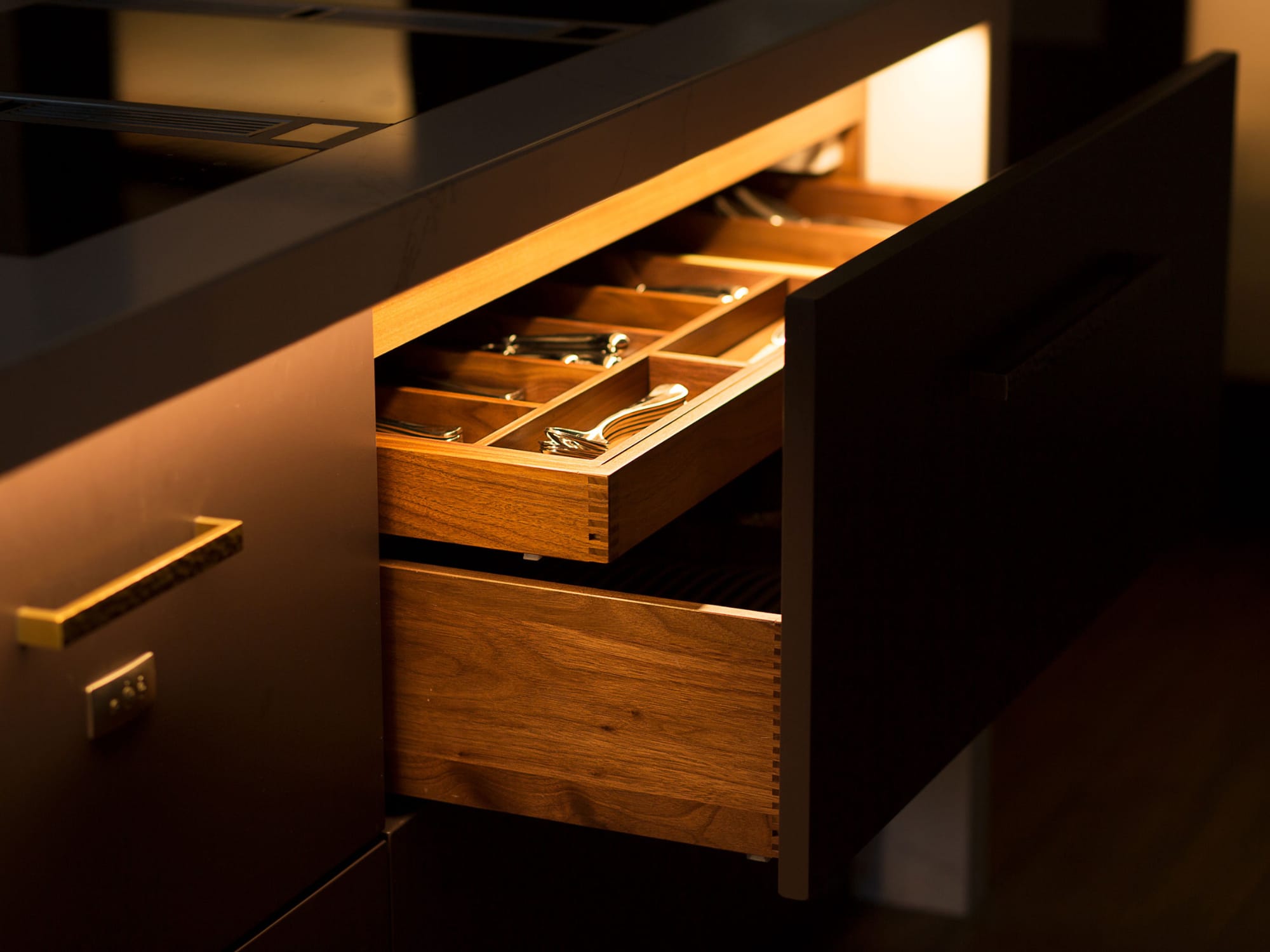 Walnut flat front drawers with LED lighting